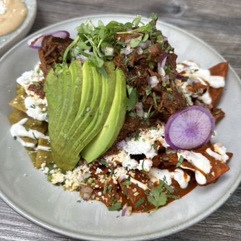 Bandoleros Cafe - Half red half green chilaquiles add short rib - Breakfast & Brunch Near Me - Huntington Beach, California Bandoleros Cafe - Half red half green chilaquiles add short rib - Breakfast & Brunch Near Me - Huntington Beach, California