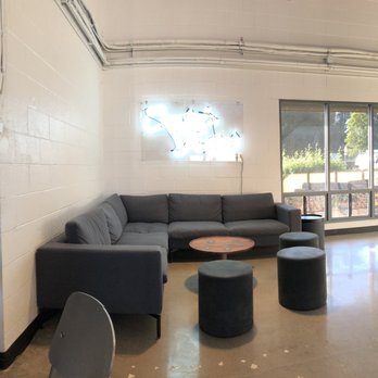 Captain Fatty's Brewery - A loungy corner of the new tasting room. You can view 2 TVs from those couches - Breweries Near Me - Goleta, California