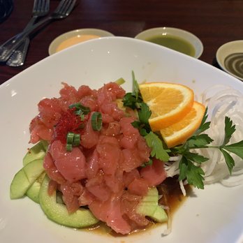 Tataki Asian Bistro - Tuna Youke on a bed of sliced cucumber with Kimchee sauce - Sushi Bars Near Me - Lauderhill, Florida Tataki Asian Bistro - Tuna Youke on a bed of sliced cucumber with Kimchee sauce - Sushi Bars Near Me - Lauderhill, Florida