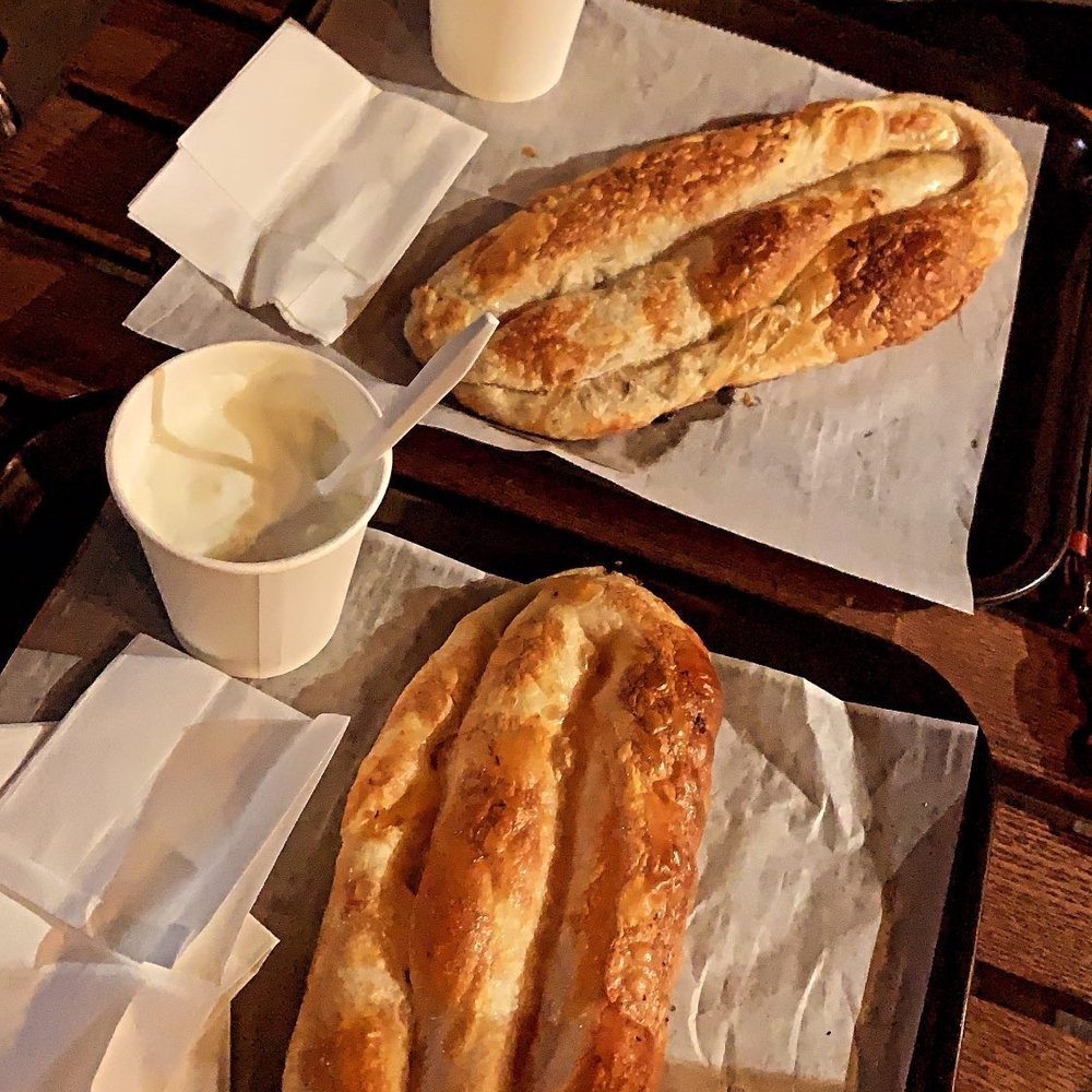 Dea An Authentic Eatery - two baguets on trays - Modern European Near Me - Bronx, New York Dea An Authentic Eatery - two baguets on trays - Modern European Near Me - Bronx, New York