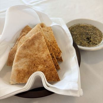 Mandaloun - Complimentary pita and Za'atar with olive oil - Mediterranean Near Me - Jacksonville, Florida Mandaloun - Complimentary pita and Za'atar with olive oil - Mediterranean Near Me - Jacksonville, Florida