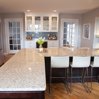 Express Kitchens - Wall Cabinets: Star Cabinetry Mero (White Shaker) Island: Star Cabinetry Dublin (Espresso Shaker) Countertops: Star Stone Tiger Skin White - Kitchen & Bath Near Me - Brookfield, Connecticut
