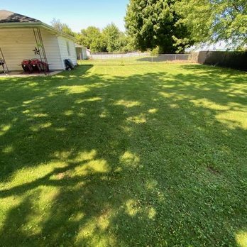 A&E Lawn Care - a backyard with a fenced in area - Lawn Services Near Me A&E Lawn Care - a backyard with a fenced in area - Lawn Services Near Me