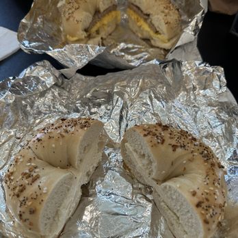 H & S Bagels - Everything bagel with honey feta cream cheese (bottom), everything bagel with sausage/egg/cheese (top) - Bagels Near Me - Nashville, Tennessee H & S Bagels - Everything bagel with honey feta cream cheese (bottom), everything bagel with sausage/egg/cheese (top) - Bagels Near Me - Nashville, Tennessee
