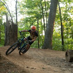 Locust Shade Park - A rider railing one of the berms along the Paw Paw trail