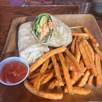The Brightside Tavern - Grilled Salmon Wrap and Sweet Potato Fries - New American Near Me - Jersey City, New Jersey The Brightside Tavern - Grilled Salmon Wrap and Sweet Potato Fries - New American Near Me - Jersey City, New Jersey
