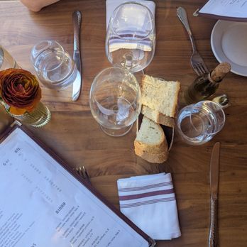 Mima Vinoteca - Table setting + bread and olive oil - Italian Near Me - Irvington, New York