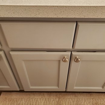 CG Beautiful Painting - a kitchen with white cabinets - Painters Near Me