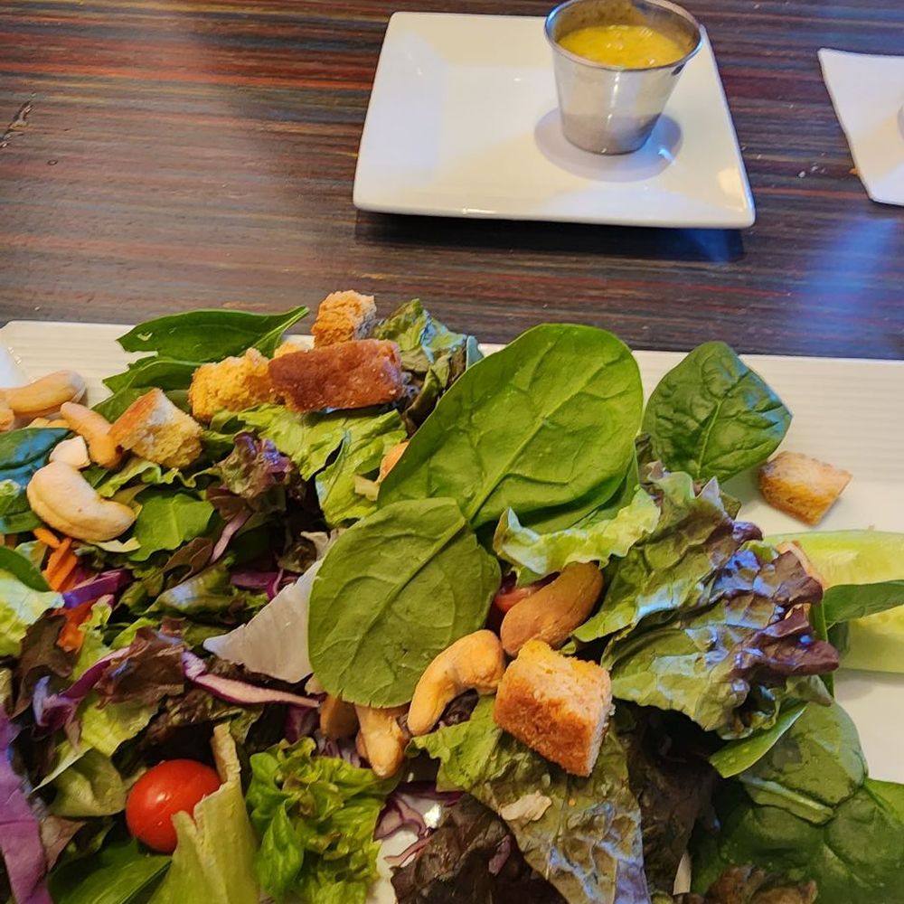 Sisserou's Caribbean Restaurant & Catering - Side salad with passionfruit vinaigrette - Caribbean Near Me - Tulsa, Oklahoma Sisserou's Caribbean Restaurant & Catering - Side salad with passionfruit vinaigrette - Caribbean Near Me - Tulsa, Oklahoma