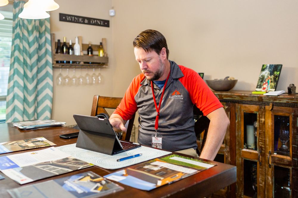 Slide of Top Notch Roofing