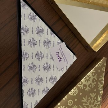 Purdys Chocolatier - three triangulars on a table - Chocolatiers & Shops Near Me - Burnaby, British Columbia