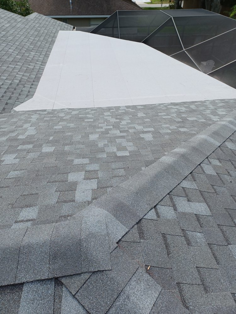 Slide of Dunedin Roofing