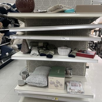 Target - Crooked shelving with random "clearance" items on it - Department Stores Near Me - Vauxhall, New Jersey