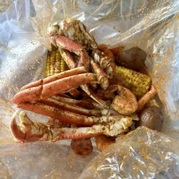 Sea boil with Snow Crab Legs, potatoes, sausage and shrimp Sea boil with Snow Crab Legs, potatoes, sausage and shrimp