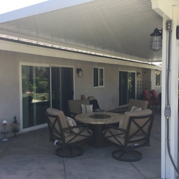 Davis Patio Covers - Notice the higher mount to increase our view from the house.   Seamless raingutters will catch the roof runoff. - Patio Coverings Near Me