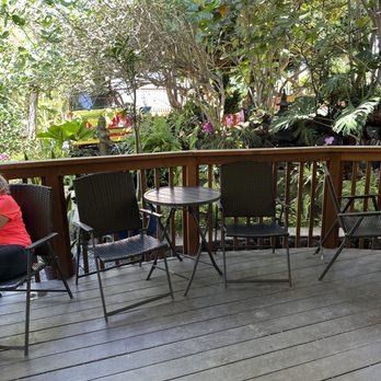 Da Green Coffee Bar - the seating by the koi pond where the chickens will come and visit you - Coffee & Tea Near Me - Kihei, Hawaii