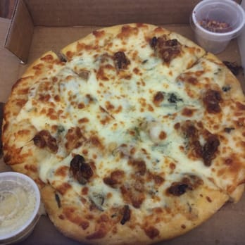 Extreme Pizza - Point Richmond - Holy Cow pizza - cheesy with walnuts underneath.  Not bad, but rich. - Pizza Near Me - Point Richmond, California