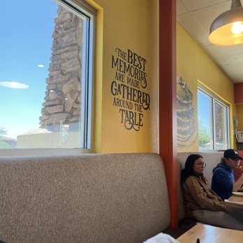 Griddlecakes - two people sitting at a table - New American Near Me - Las Vegas, Nevada