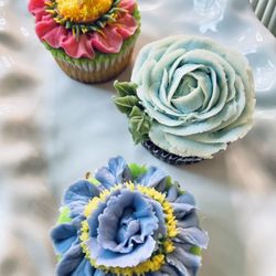Delectable by Design - Blue, pink and purple plated cupcakes