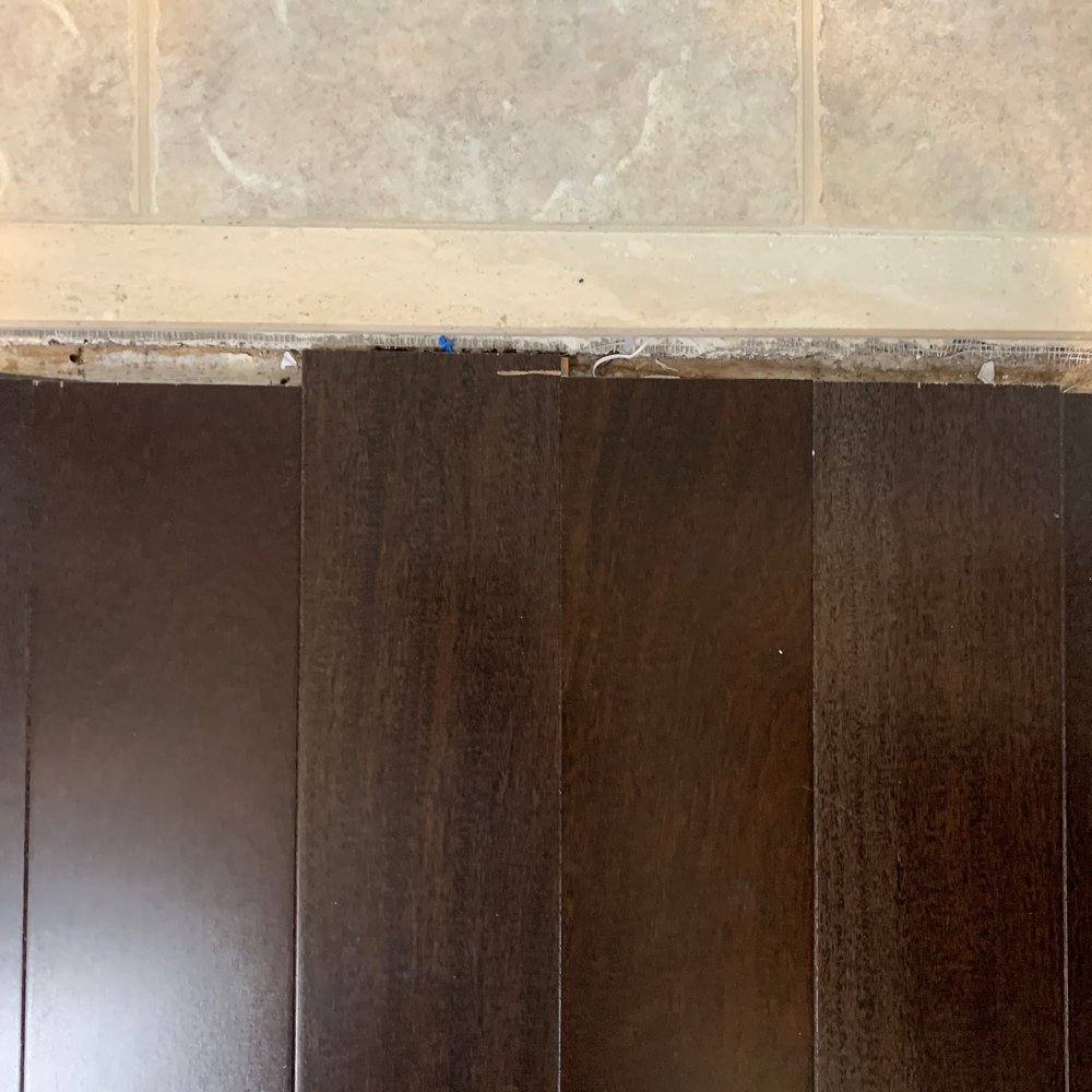 AB Flooring & Stairs - a close up of a wood floor - Flooring Near Me