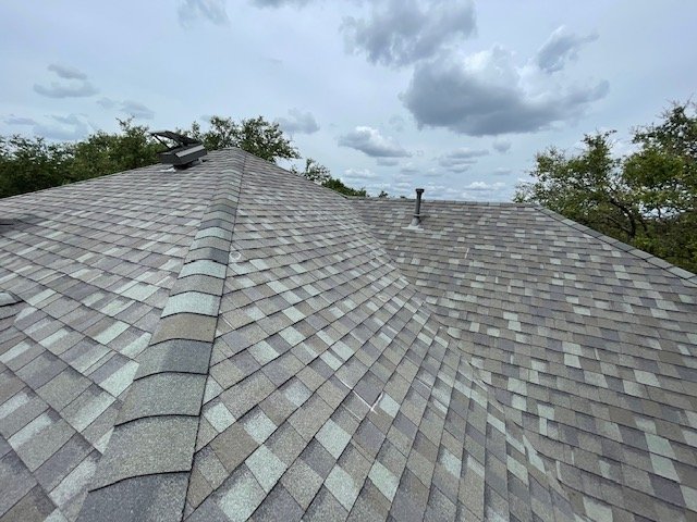 Slide of Top Notch Roofing