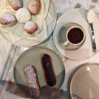 Juliet - Brown sugar Madeline, hot chocolate, dark chocolate and lemon yuzu poppyseed eclair - French Near Me - Culver City, California Juliet - Brown sugar Madeline, hot chocolate, dark chocolate and lemon yuzu poppyseed eclair - French Near Me - Culver City, California