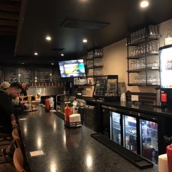 BEERTOWN - My new favorite place, draft list on the wall! TVs and comfy barstools