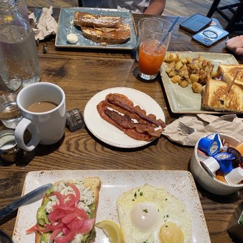 First Watch - Avocado toast with crabmeat, Bacon, French toast, ham and Gruyère sandwich. - Breakfast & Brunch Near Me - Champions Gate, Florida First Watch - Avocado toast with crabmeat, Bacon, French toast, ham and Gruyère sandwich. - Breakfast & Brunch Near Me - Champions Gate, Florida
