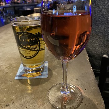 Narrow Bridge - Drinks @ the bar. That's one of the best pours of wine I've ever seen! - Brewpubs Near Me - Green Bay, Wisconsin