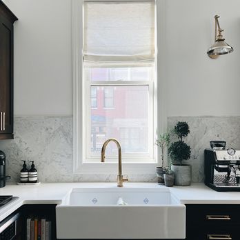 Skyline Window Coverings - Neutral-colored roman shades bring in soft light and privacy options for any space. - Shades & Blinds Near Me - Chicago, Illinois