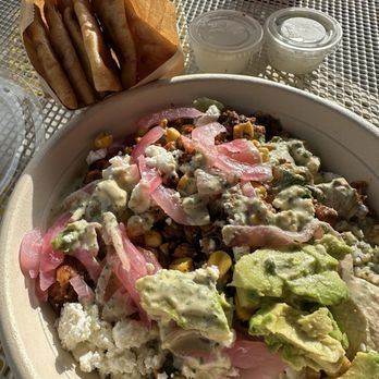 CAVA - Harissa avocado with splendid greens, and I tried the lemon herb tahini and garlic dressing - Mediterranean Near Me - Plantation, Florida