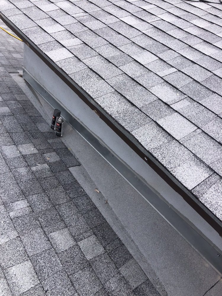 Slide of Peninsula Roofing