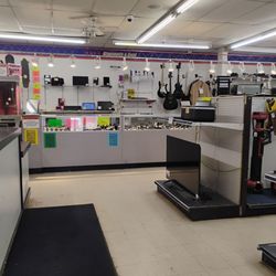 Cash America Pawn - Clean with little merch.