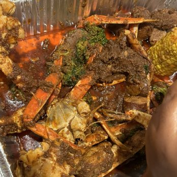 Shell Shack - A large clump of seasoning and mushy broccoli - Seafood Near Me - Fort Worth, Texas