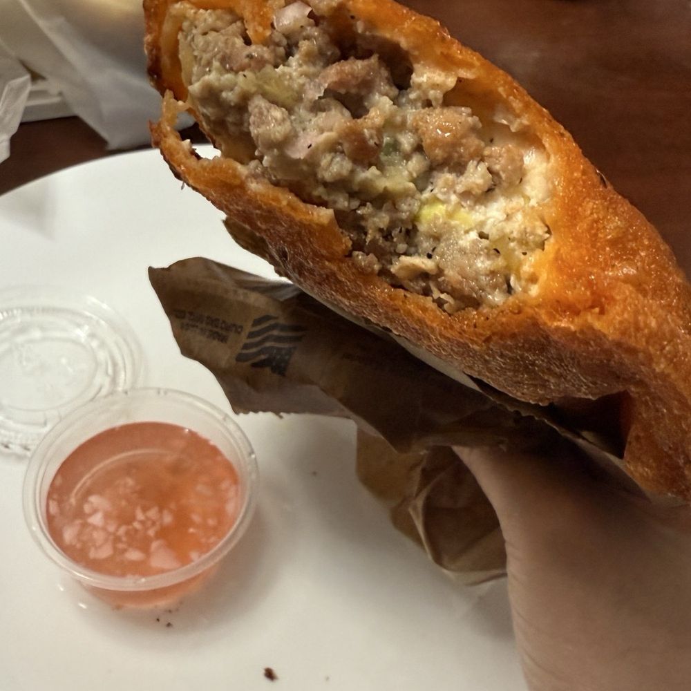 Russ Fam Kitchen - So much filling in this Ilocos Empanada | IG: @nomwithelaine - Mexican Near Me - Daly City, California Russ Fam Kitchen - So much filling in this Ilocos Empanada | IG: @nomwithelaine - Mexican Near Me - Daly City, California