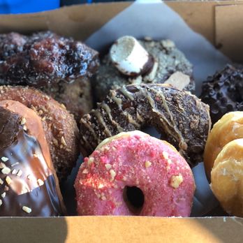 Sweet Dozen - Choc w/ PB Filling, strawberry, glazed, cinnamon rolls,snickers(?), banana fritter, s'mores & chocolate chip doughnuts. - Donuts Near Me - Sacramento, California Sweet Dozen - Choc w/ PB Filling, strawberry, glazed, cinnamon rolls,snickers(?), banana fritter, s'mores & chocolate chip doughnuts. - Donuts Near Me - Sacramento, California
