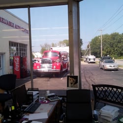Reliable Auto Ctr - Antique fire truck at Reliable Auto Center