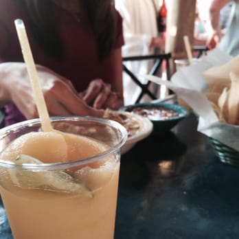 Hula Hut - Killer mango margarita and nice looking ladies... (That's my fiancé) - Tex-Mex Near Me - Austin, Texas