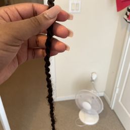 The braid that fell out that I went back to get put in after my appointment. Fell out in a week