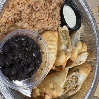 Chiloso Mexican Bistro - Taquitos with black beans and rice. - Mexican Near Me - Denton, Texas Chiloso Mexican Bistro - Taquitos with black beans and rice. - Mexican Near Me - Denton, Texas