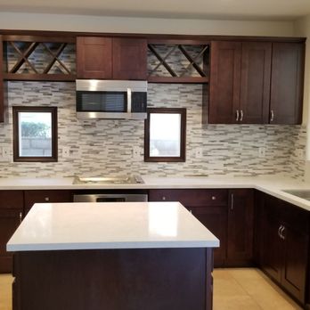 My Artistic Tile - a kitchen with stainless steel appliances - Tiling Near Me - Oxnard, California