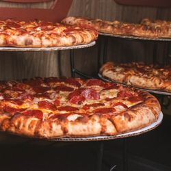 Twisted Pin - Hot, oven-baked pizzas served fresh at Twisted Pin, offering classic comfort food with a modern twist--ideal for bowling night...