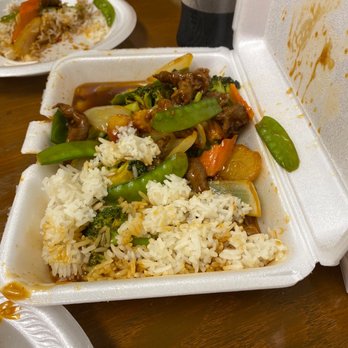 New China Restaurant - a takeout container of rice and vegetables - Chinese Near Me - Nashville, Tennessee New China Restaurant - a takeout container of rice and vegetables - Chinese Near Me - Nashville, Tennessee