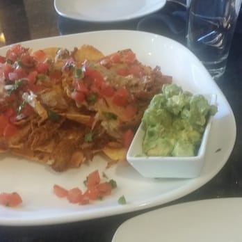 Chimayo Stone Fired Kitchen - Pork nachos - just the right "kick" - New American Near Me - Durango, Colorado Chimayo Stone Fired Kitchen - Pork nachos - just the right "kick" - New American Near Me - Durango, Colorado
