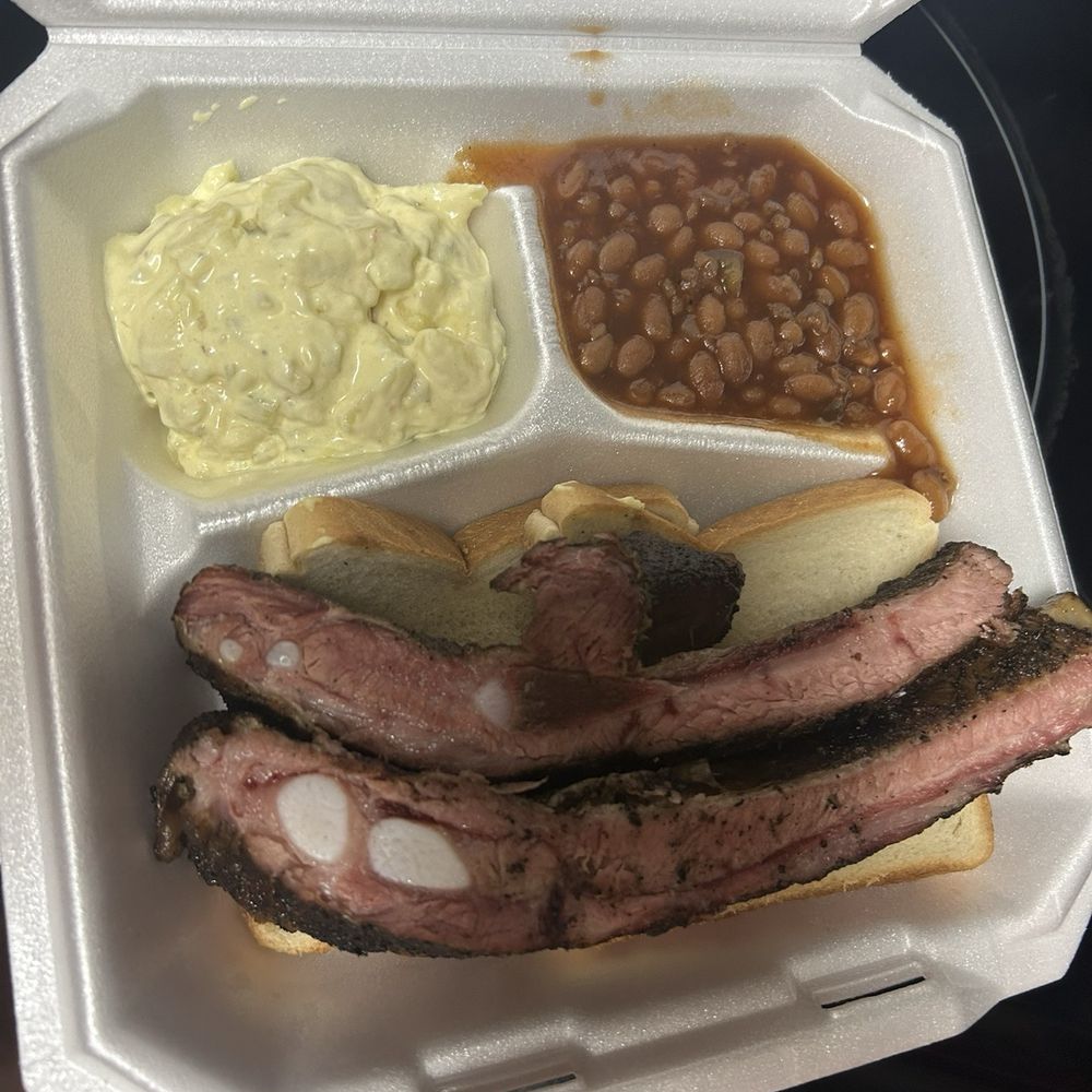The Purple Pig BBQ - Rib plate with baked beans and potato salad - Barbeque Near Me - Schertz, Texas The Purple Pig BBQ - Rib plate with baked beans and potato salad - Barbeque Near Me - Schertz, Texas