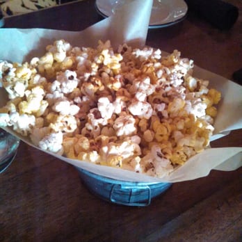 Moonshine Grill - Complimentary cheddar and chili powder fresh-popped popcorn while we wait for our food - Southern Near Me - Austin, Texas Moonshine Grill - Complimentary cheddar and chili powder fresh-popped popcorn while we wait for our food - Southern Near Me - Austin, Texas