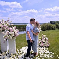 She said yes! Proposal on Lake Nagawicka flower set upvgrand enough for Cinderella