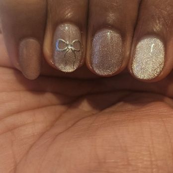 Sun Nail - The lady chose a great size charm that wasn't too big for me. She also chose a great base color based off of the picture - Nail Salons Near Me - Pasadena, California