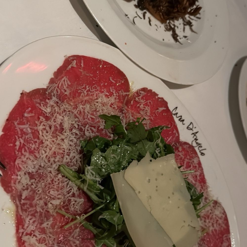 Casa D'Angelo - Burrata over mushrooms & shaved truffle, beef carpaccio - Italian Near Me - Fort Lauderdale, Florida