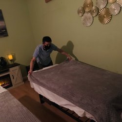 Relax Zone Massage - Lee is cleaning after the massage